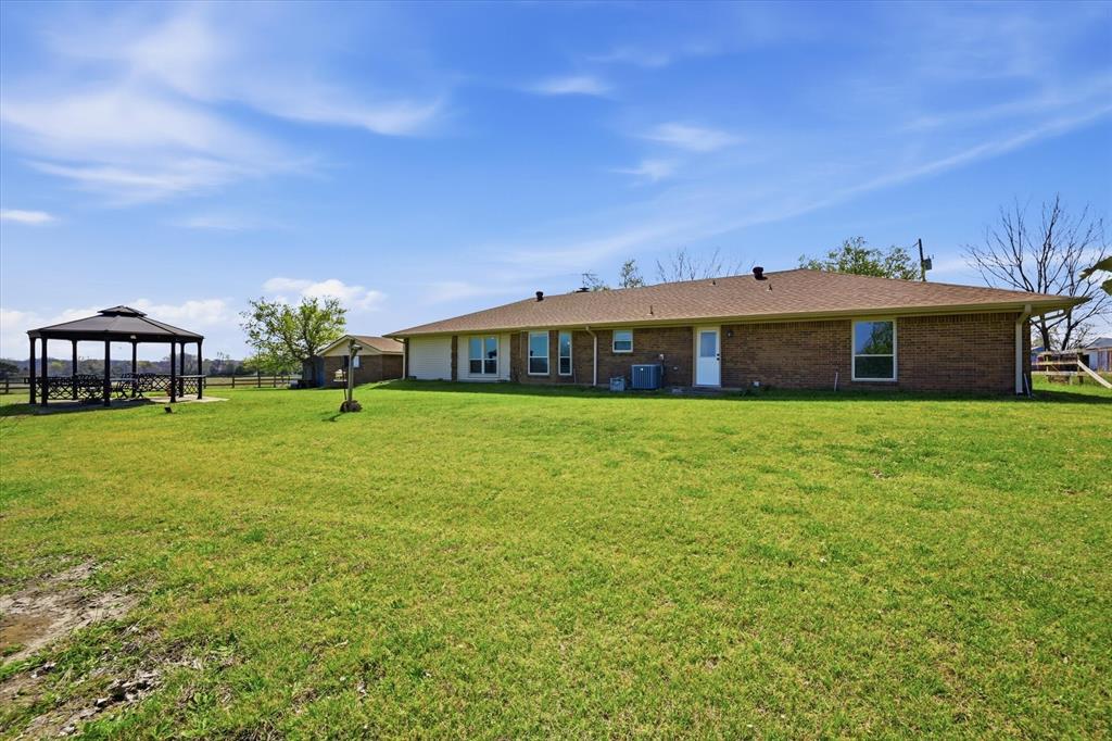 12099 County Road 1028 Blue Ridge, TX 75424 - Photo 27 of 36 a view of house with a garden