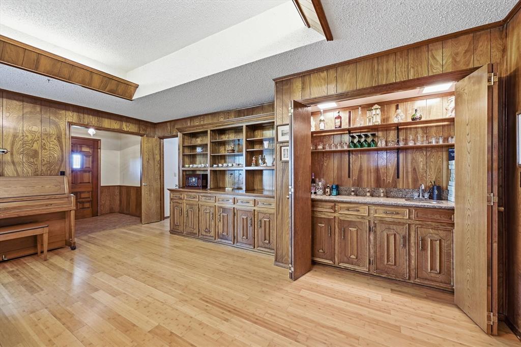 12099 County Road 1028 Blue Ridge, TX 75424 - Photo 8 of 34 a kitchen with stainless steel appliances granite countertop a stove and cabinets