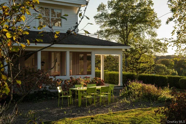 a front view of a house with swimming pool