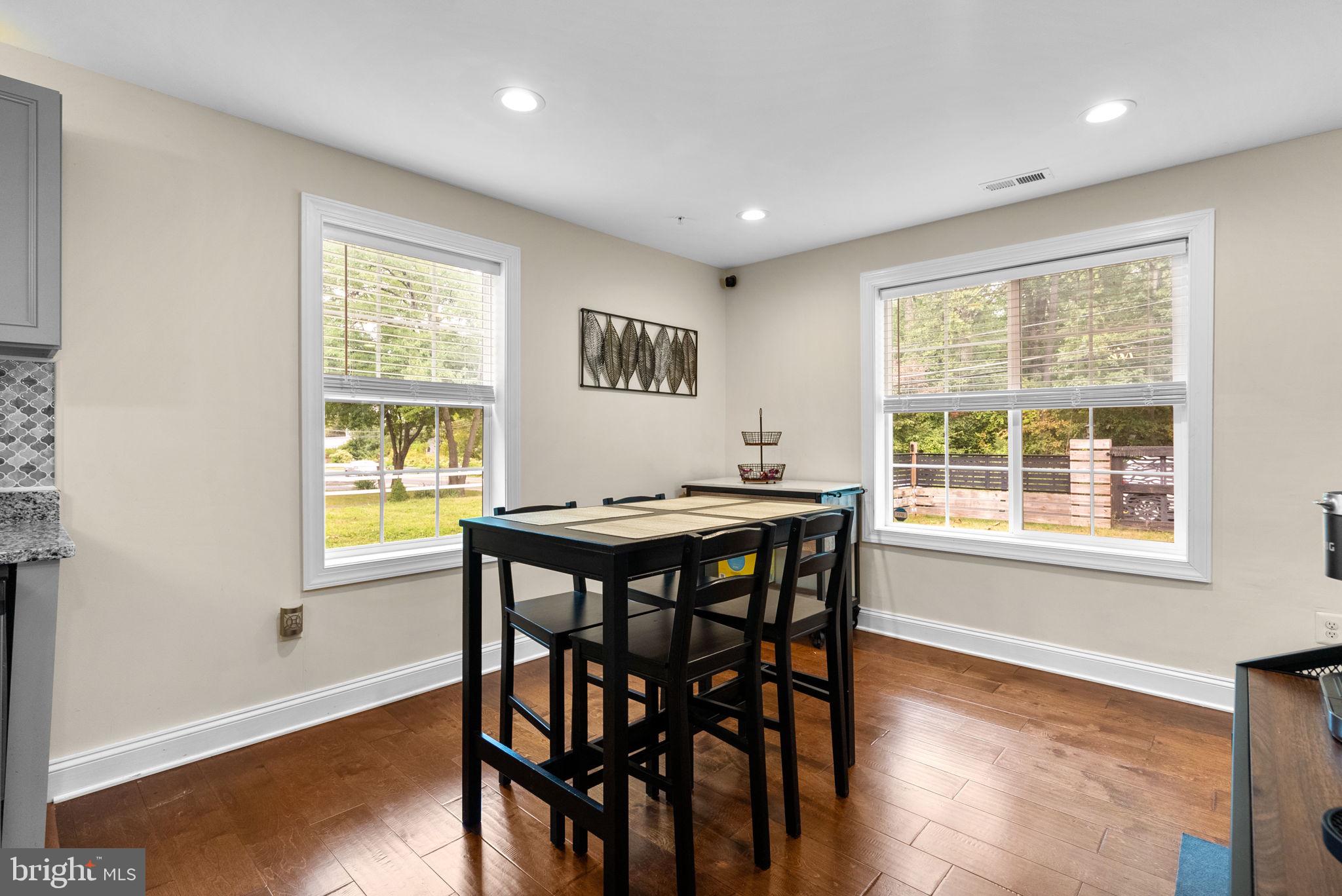9621 Temple Hill Road Clinton, MD 20735 - Photo 17 of 48 a view of a dining room with furniture and wooden floor