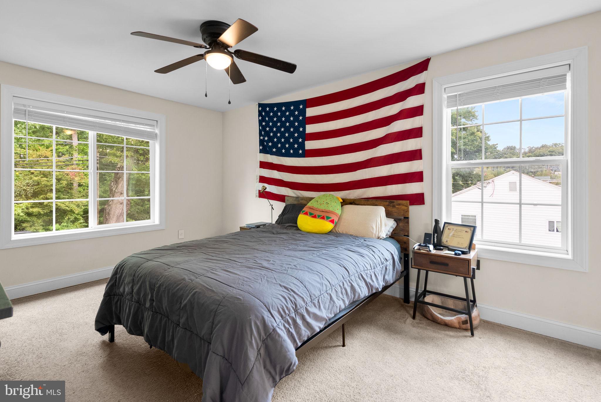 9621 Temple Hill Road Clinton, MD 20735 - Photo 23 of 48 a bedroom with a bed and a window