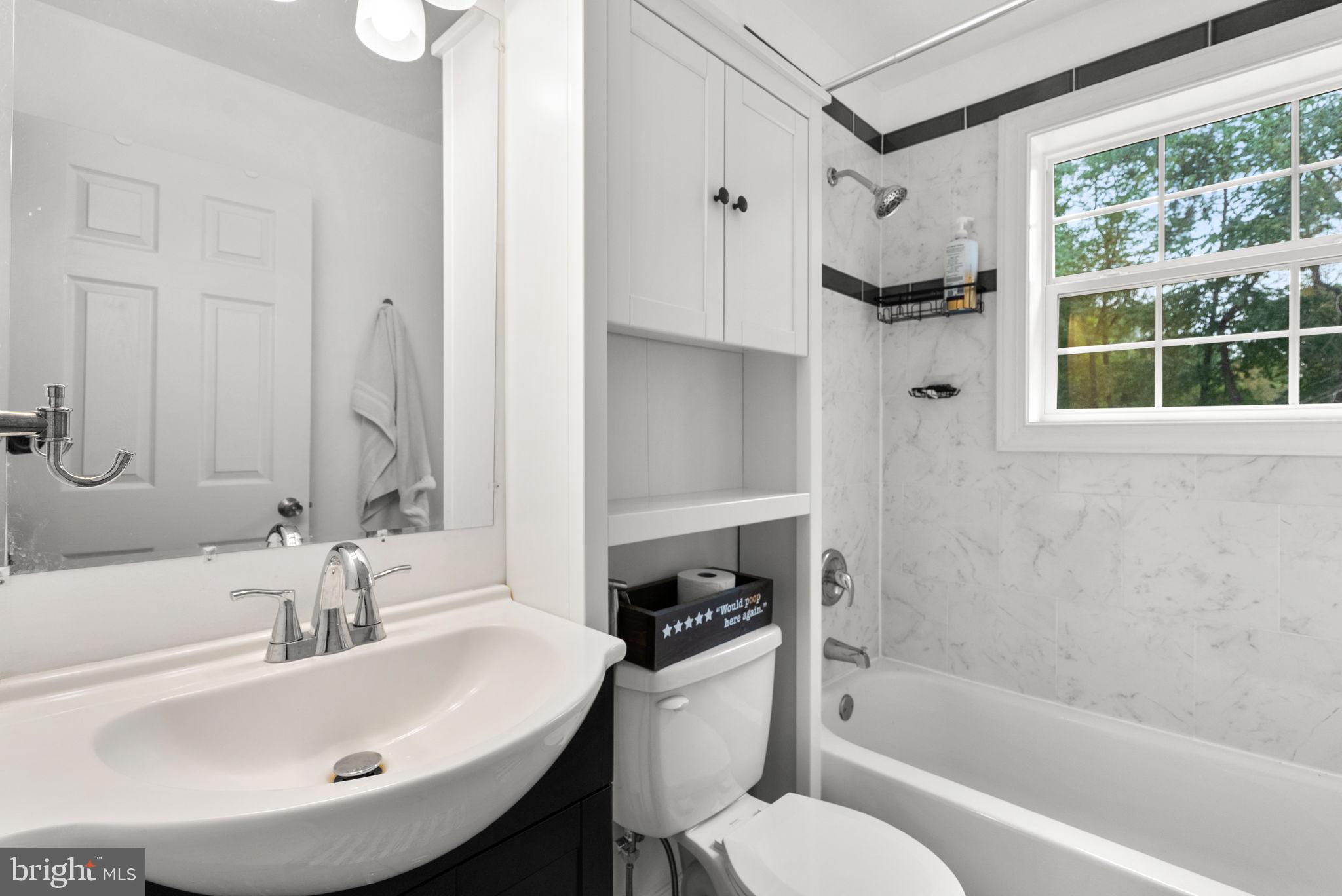 9621 Temple Hill Road Clinton, MD 20735 - Photo 30 of 48 a bathroom with a sink bathtub and a toilet