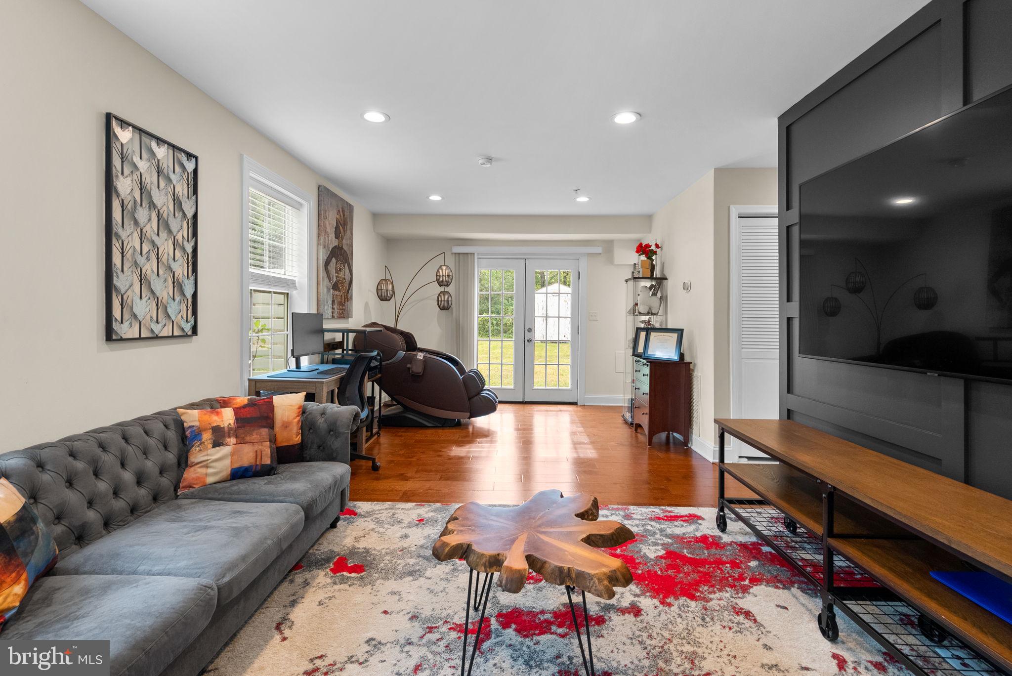 9621 Temple Hill Road Clinton, MD 20735 - Photo 3 of 48 a living room with furniture and a wooden floor