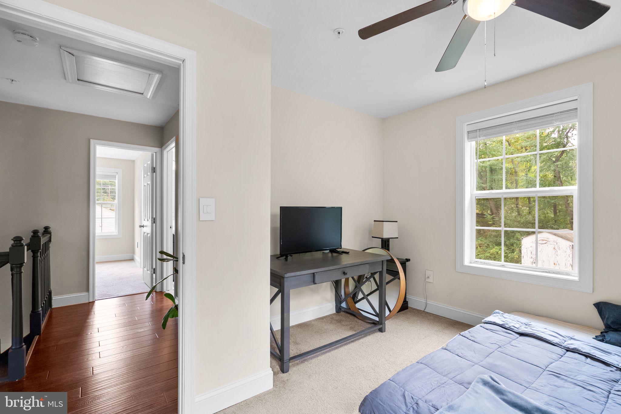 9621 Temple Hill Road Clinton, MD 20735 - Photo 34 of 48 a view of a livingroom with workspace and a window