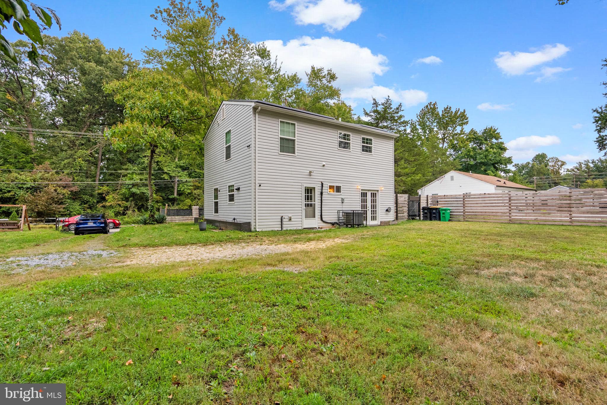 9621 Temple Hill Road Clinton, MD 20735 - Photo 37 of 48 a view of a house with backyard and garden