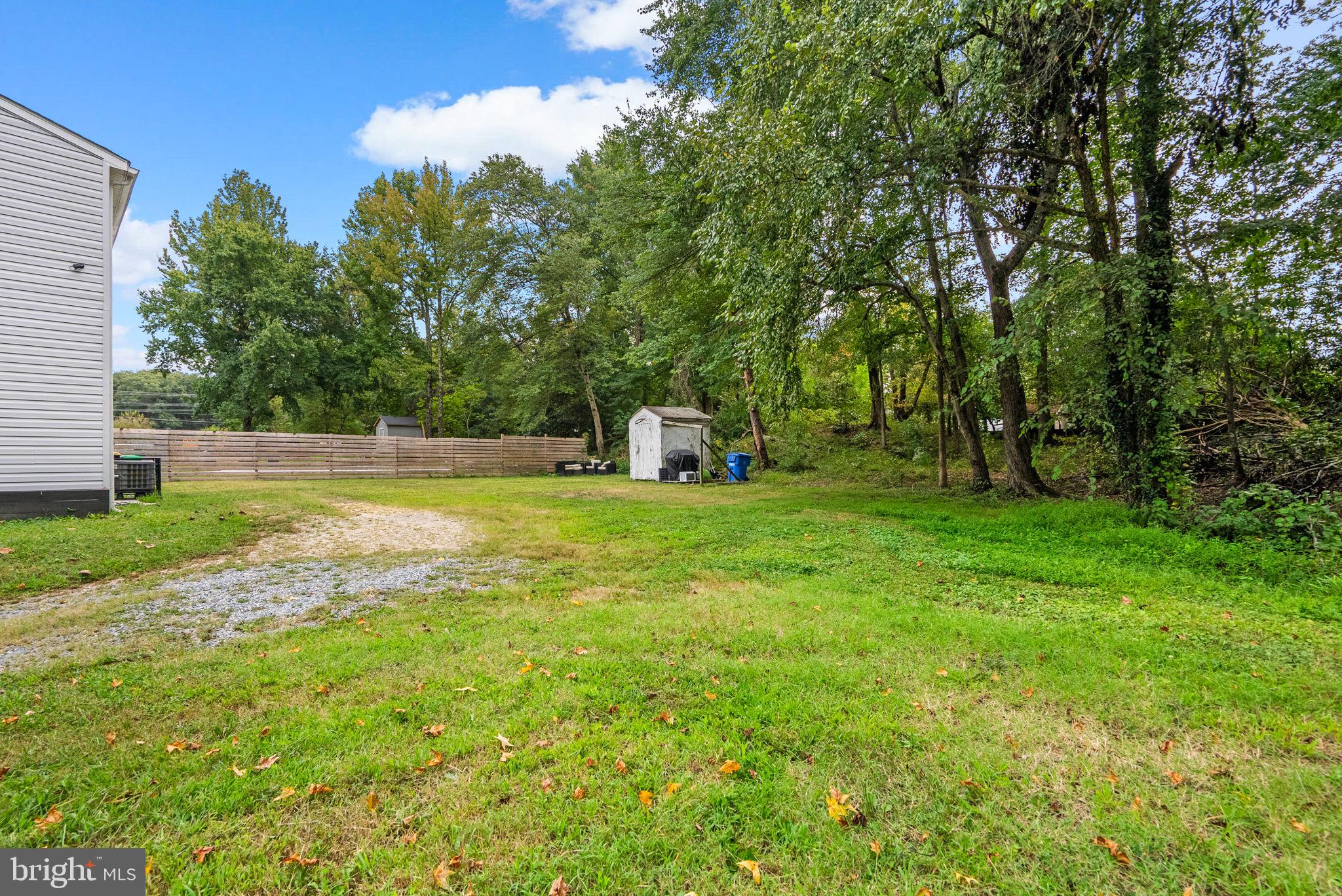 9621 Temple Hill Road Clinton, MD 20735 - Photo 38 of 48 a view of a house with a yard
