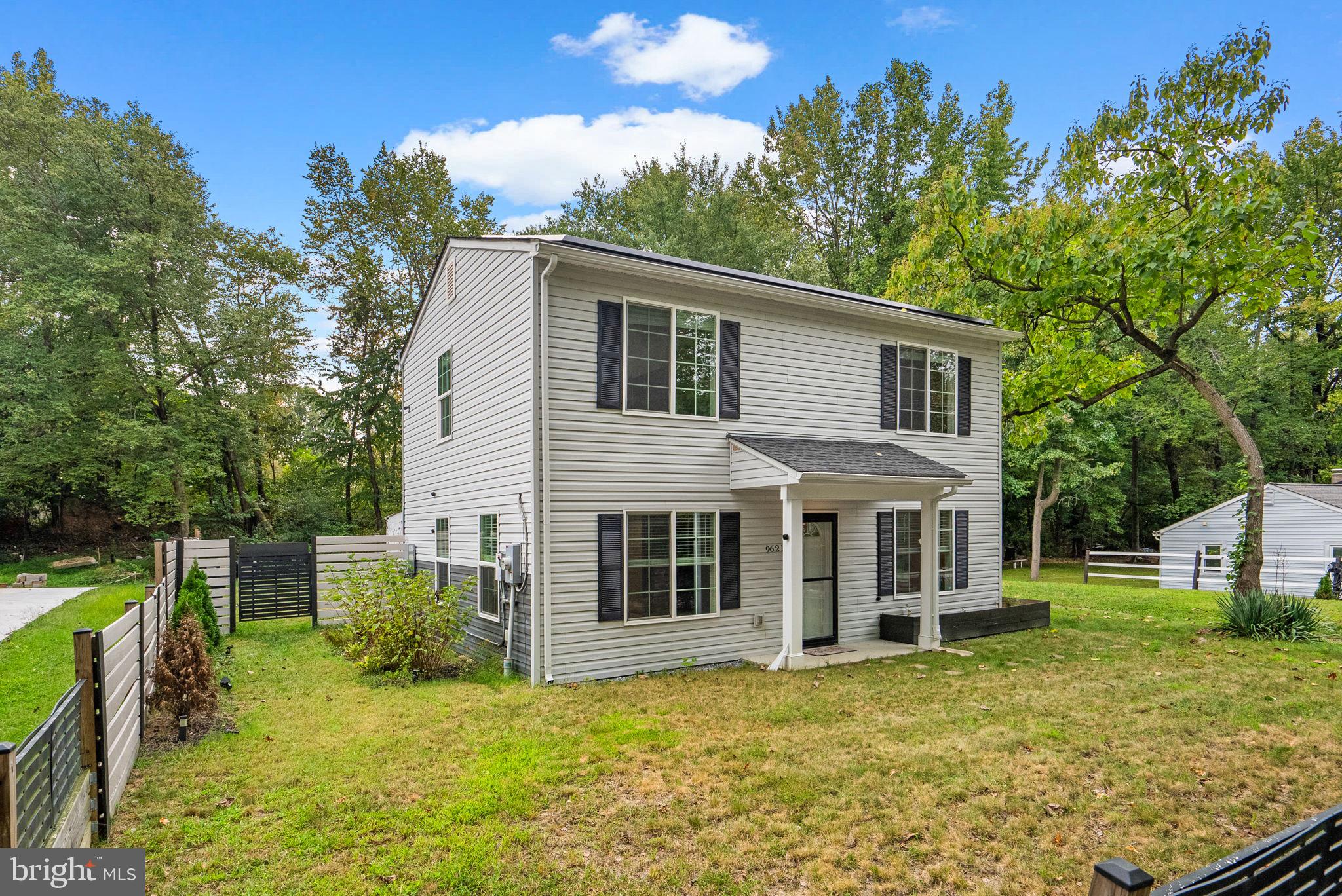 9621 Temple Hill Road Clinton, MD 20735 - Photo 39 of 48 a view of a house with a yard