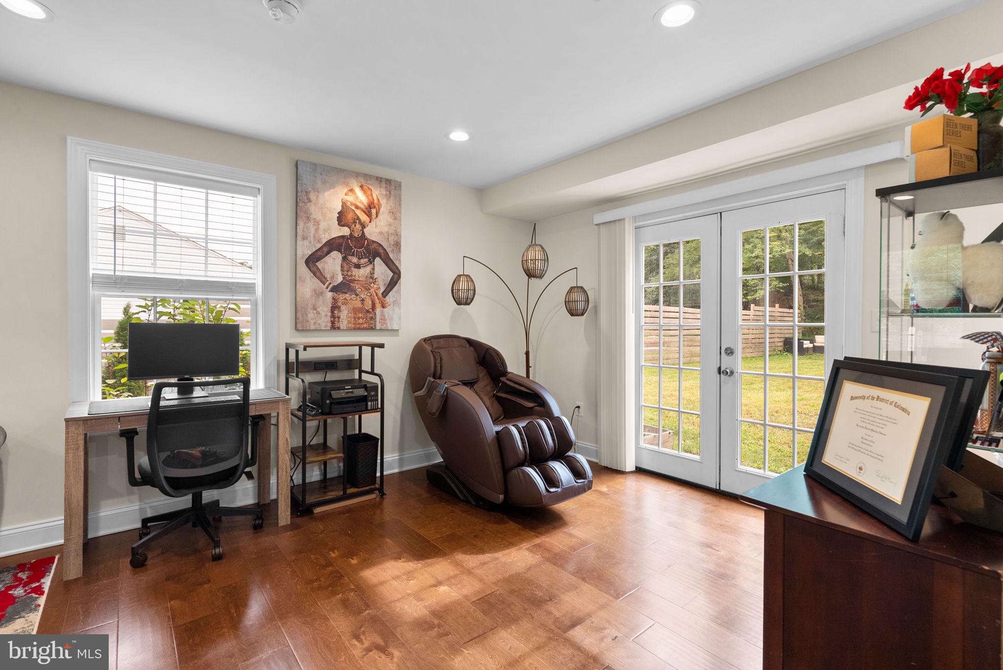 9621 Temple Hill Road Clinton, MD 20735 - Photo 8 of 48 a view of a workspace with furniture and a window
