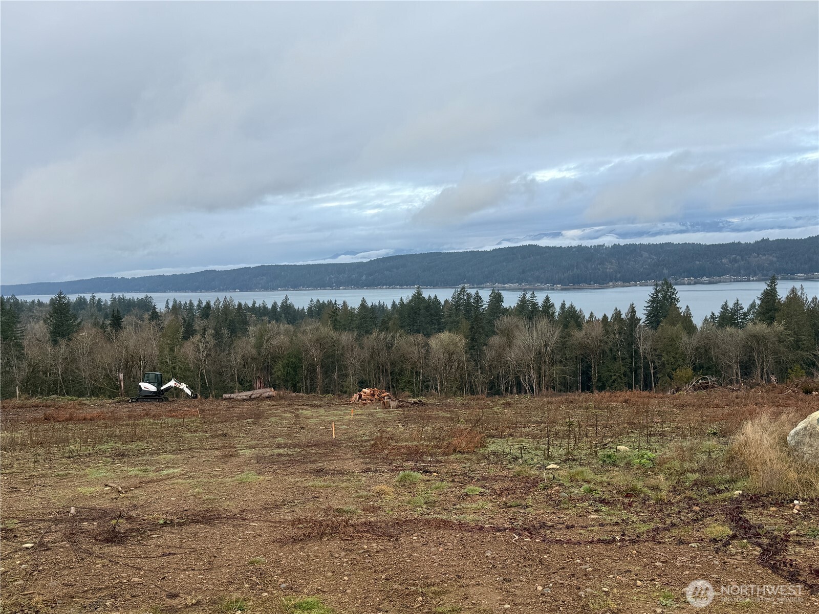 7-track 7-track Rimstone Loop Belfair, WA 98528 - Photo 1 of 8 a view of a field with trees in background