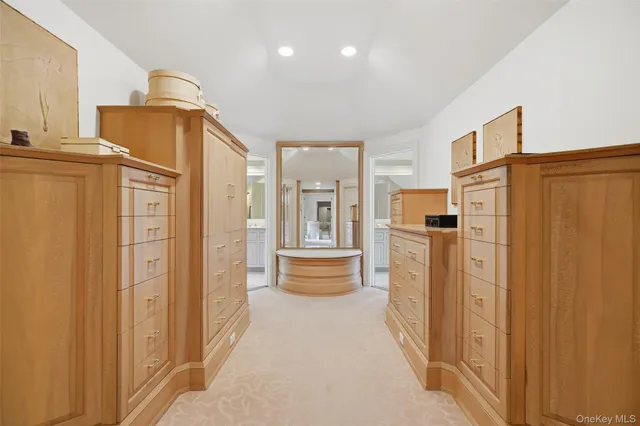 a bathroom with a double vanity sink and mirror