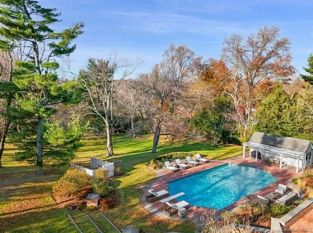 a view of a yard with an outdoor space