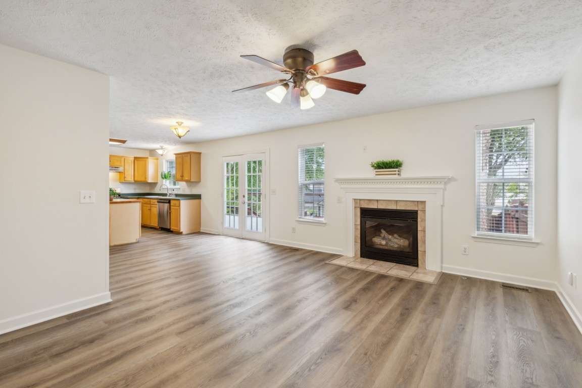 1948 Portway Road Spring Hill, TN 37174 - Photo 13 of 29 a view of an empty room with a fireplace and a window