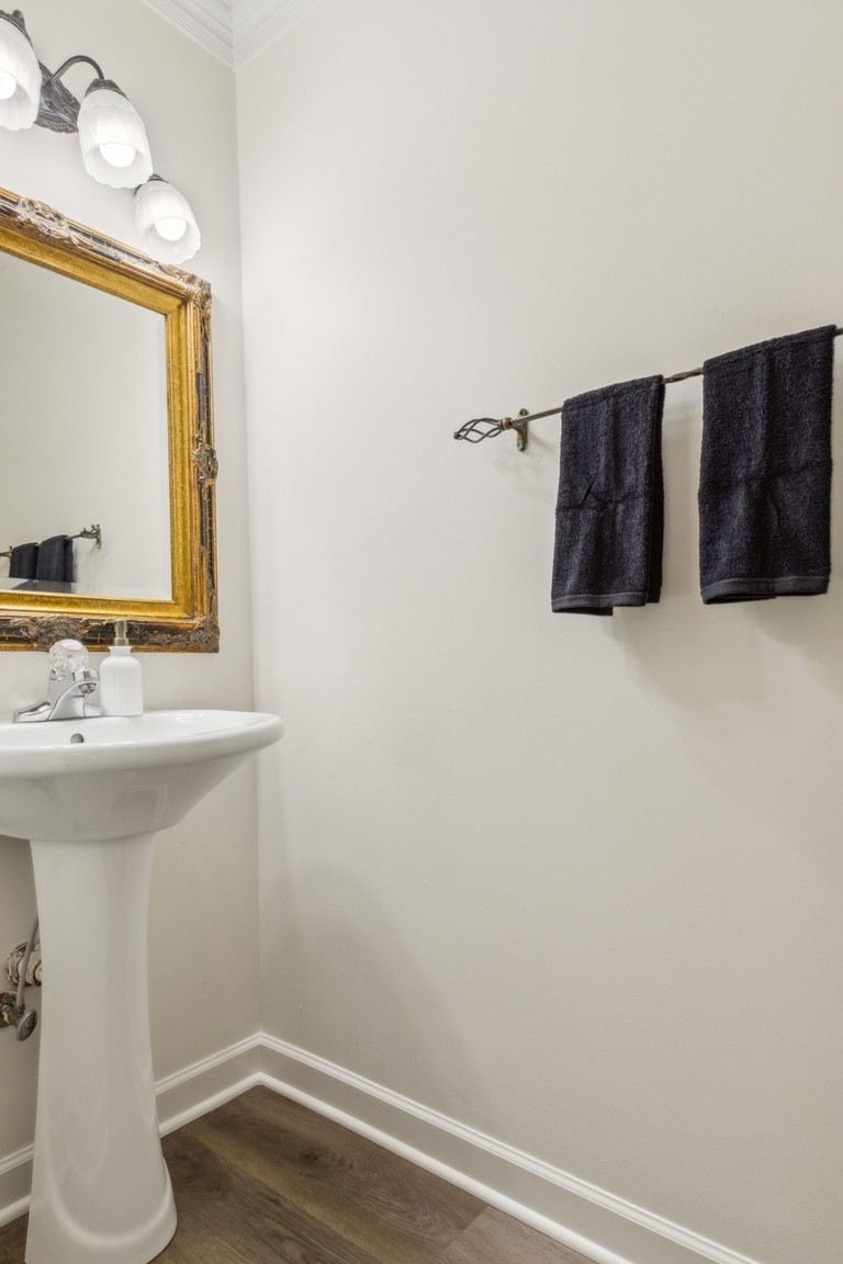 1948 Portway Road Spring Hill, TN 37174 - Photo 15 of 29 a bathroom with a sink and a mirror