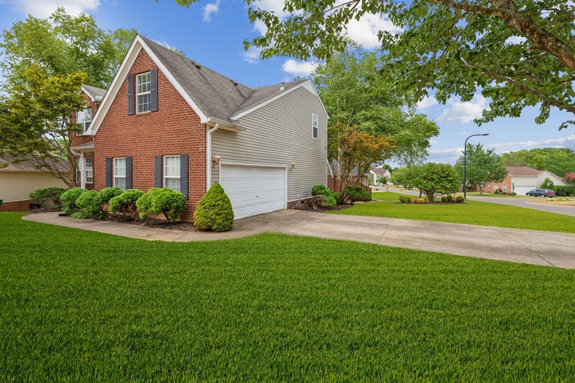 1948 Portway Road Spring Hill, TN 37174 - Photo 2 of 29 a front view of house with yard and green space