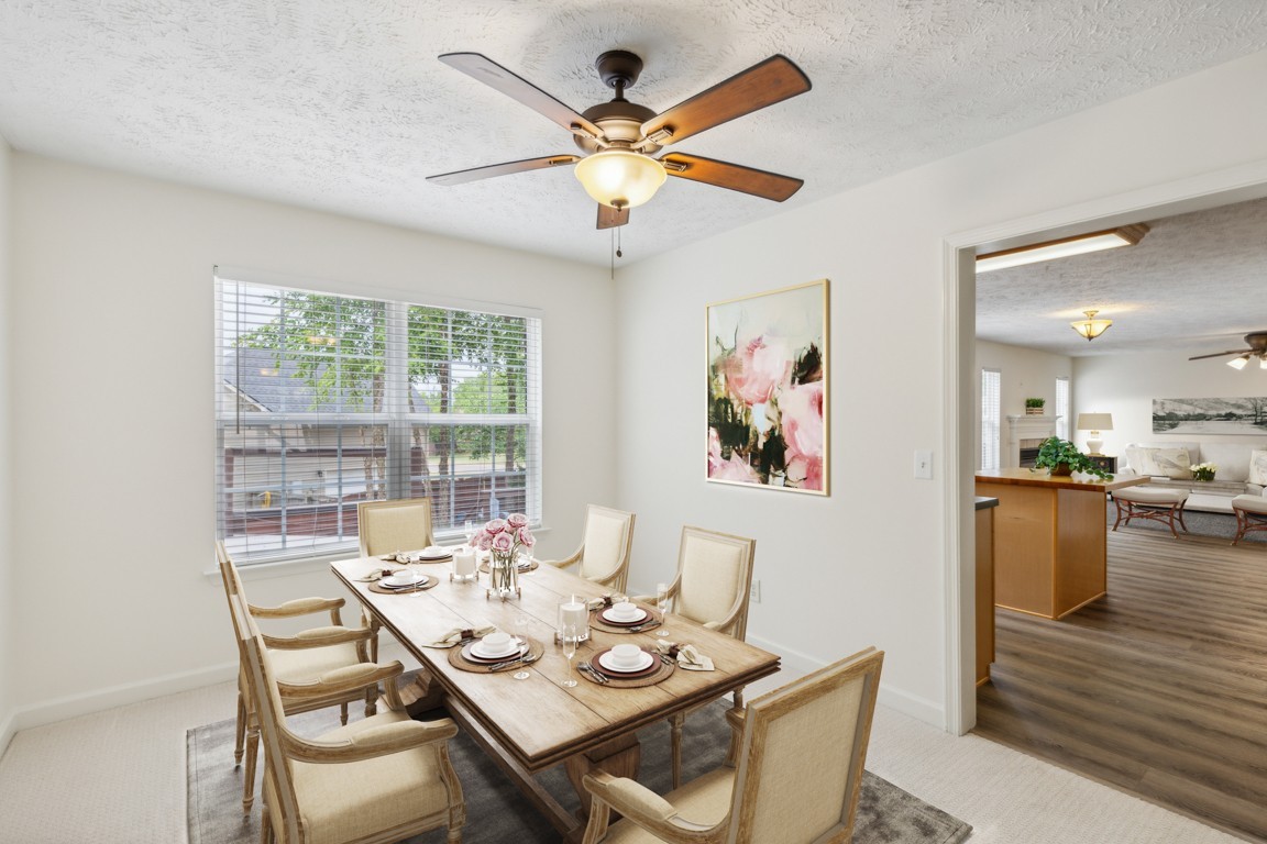 1948 Portway Road Spring Hill, TN 37174 - Photo 7 of 29 a view of a dining room with furniture window and outside view
