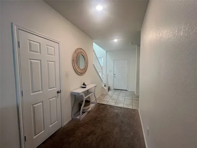 a view of a hallway with elevator