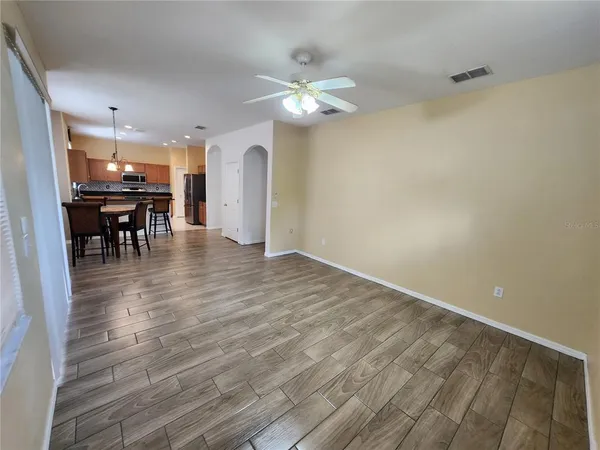 a view of dining room with furniture and chandelier