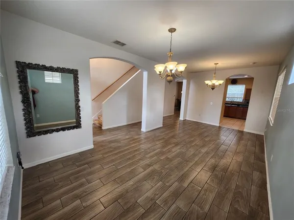 a view of a livingroom with a furniture