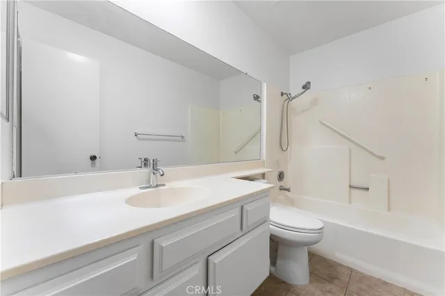 a bathroom with a sink a toilet and a bathtub