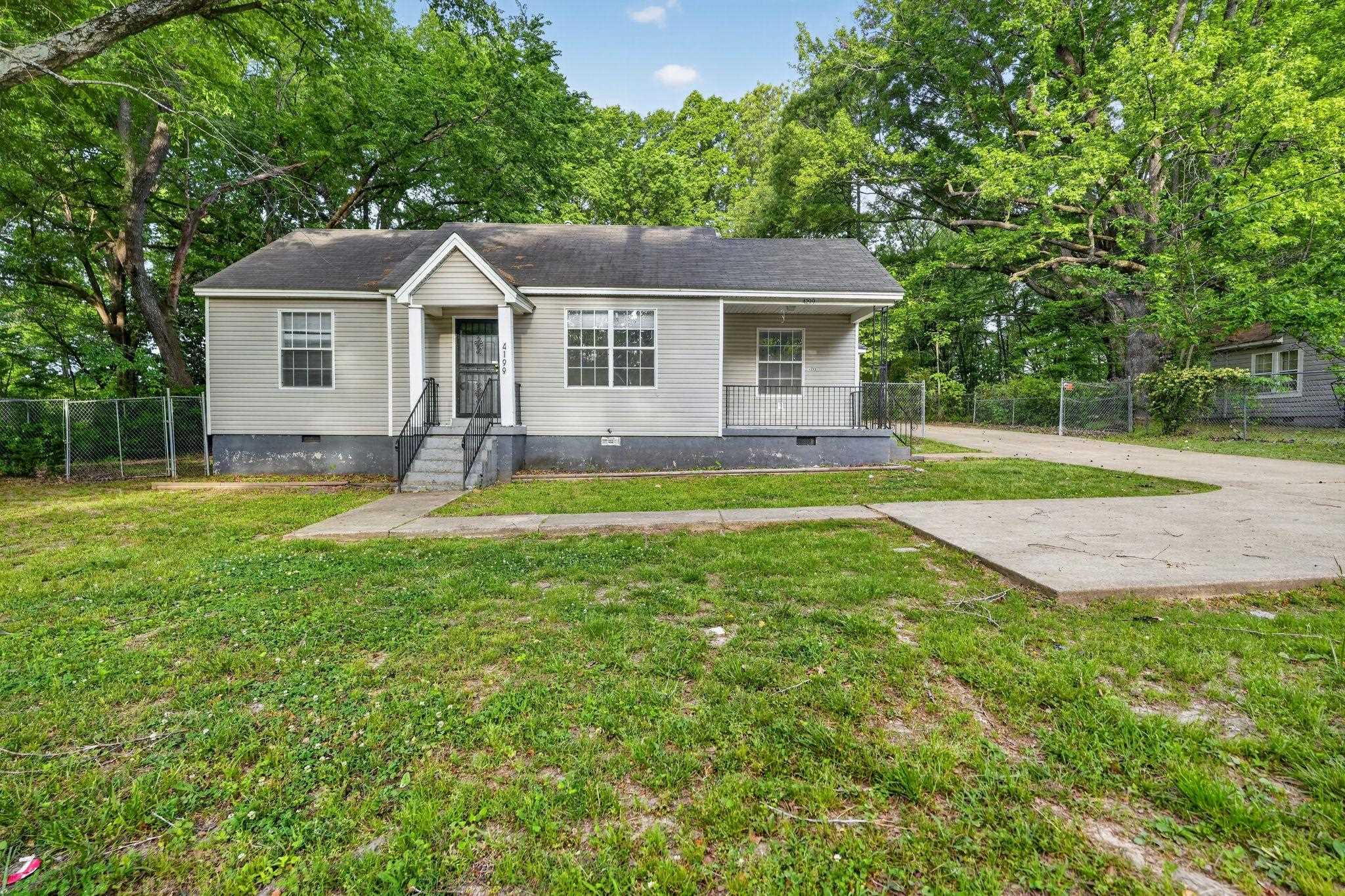 4199 Auburn Road Memphis, TN 38116 - Photo 2 of 32 Single-story residence featuring light gray siding and a dark roof