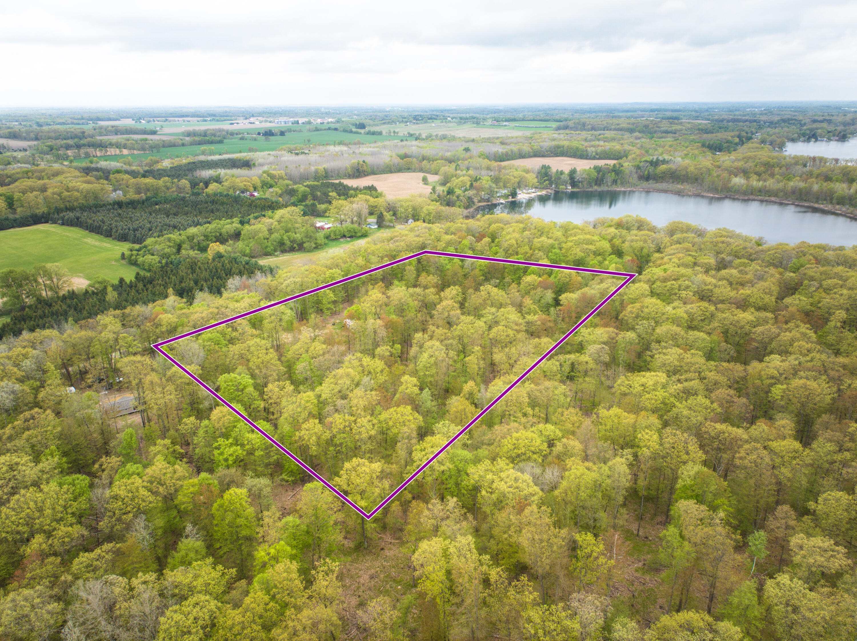 4848 Cutler Road Northwest Six Lakes, MI 48886 - Photo 22 of 23 DJI_20250427170847_0019_D_56