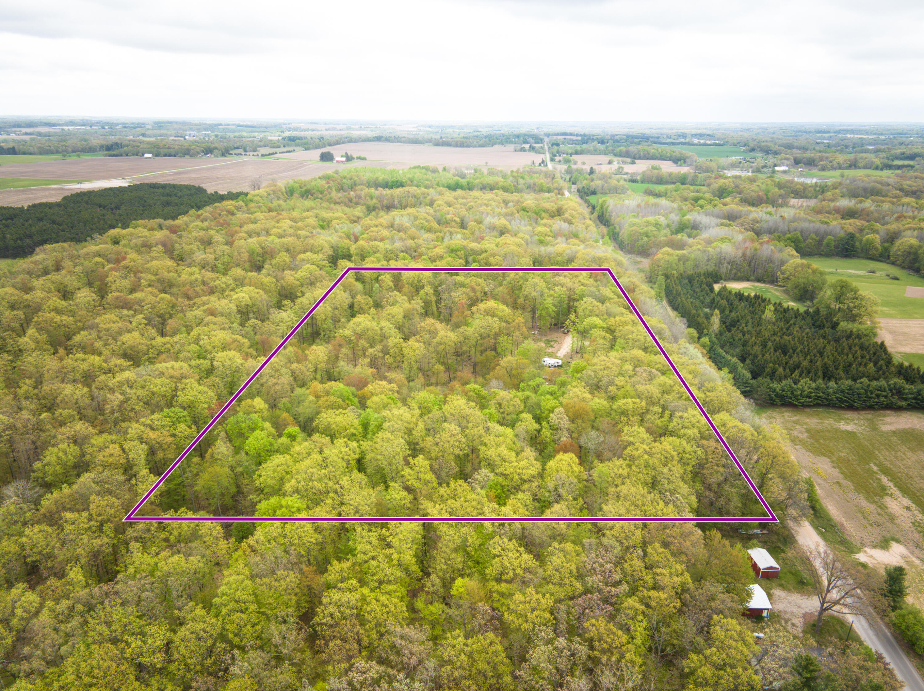 4848 Cutler Road Northwest Six Lakes, MI 48886 - Photo 23 of 23 DJI_20250427171024_0024_D_57