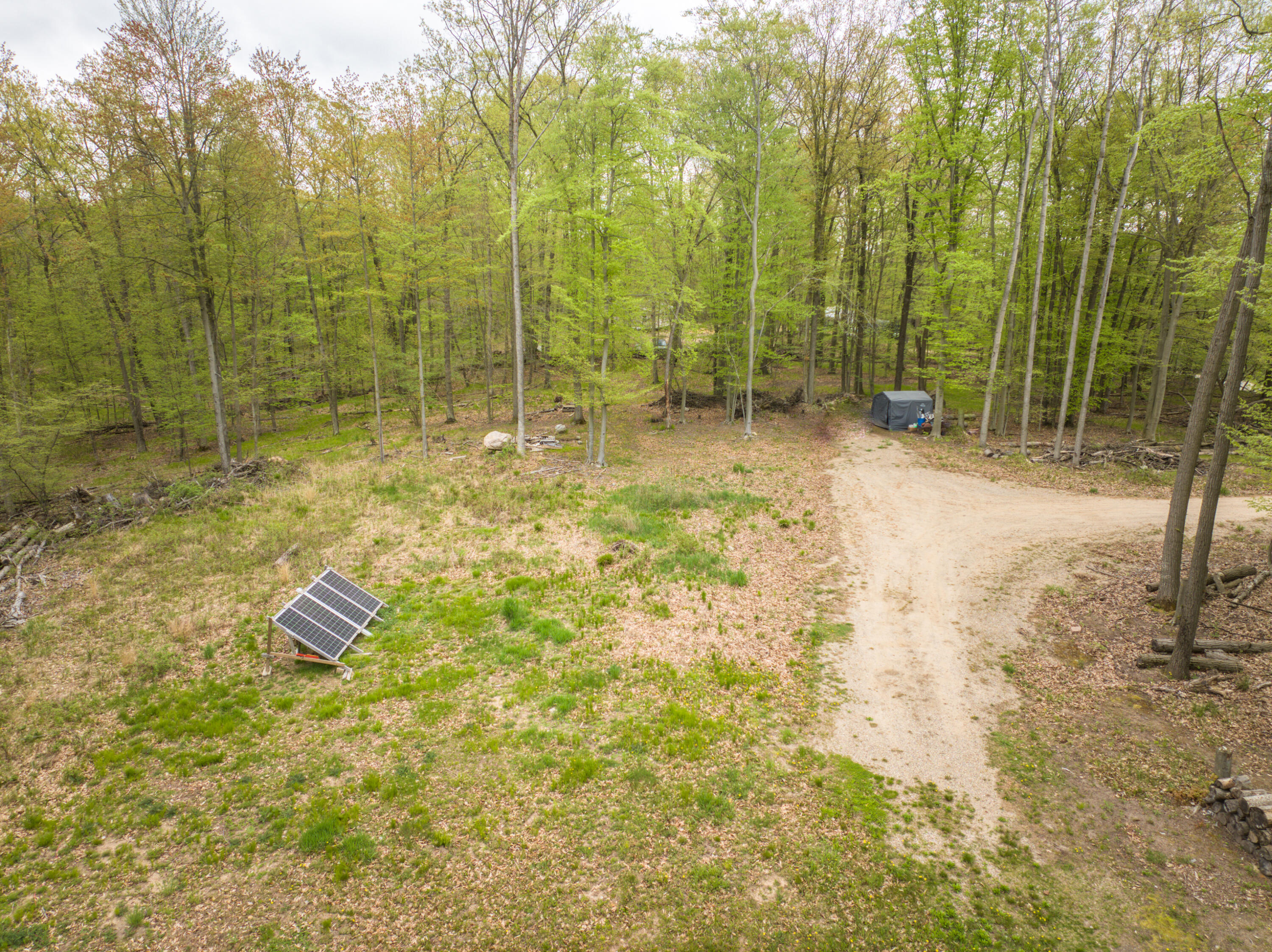 4848 Cutler Road Northwest Six Lakes, MI 48886 - Photo 5 of 23 DJI_20250427170317_0978_D_48