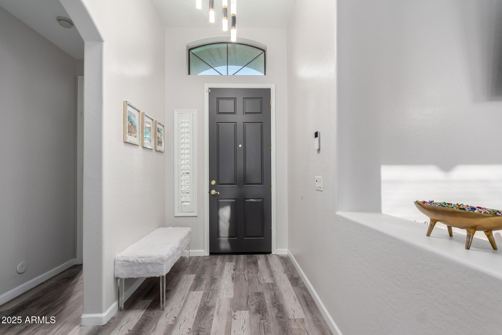 854 South Del Rio Court Apache Junction, AZ 85119 - Photo 12 of 57 a view of a livingroom with furniture and staircase