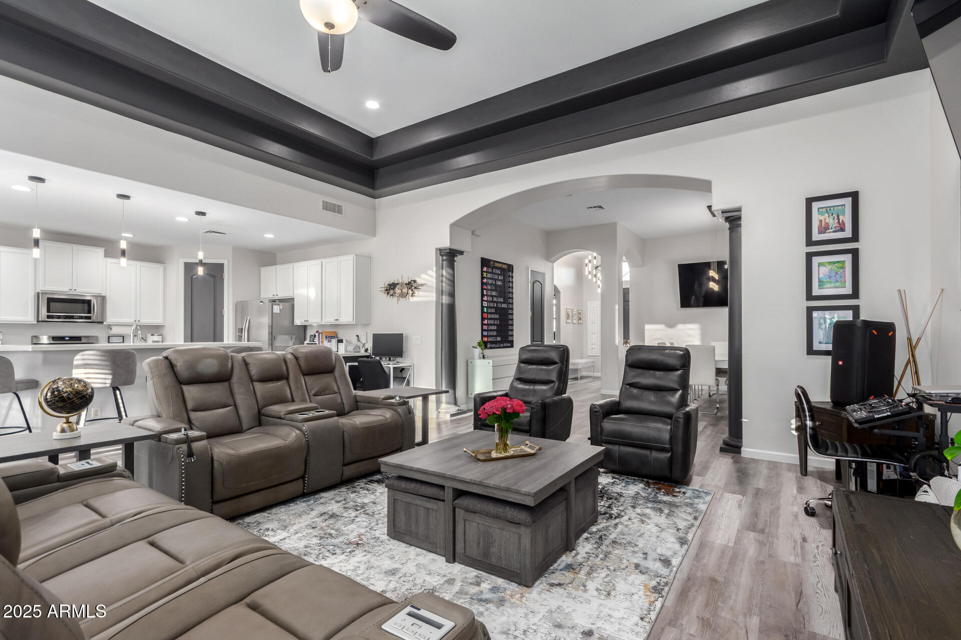 854 South Del Rio Court Apache Junction, AZ 85119 - Photo 18 of 57 a living room with furniture and a chandelier