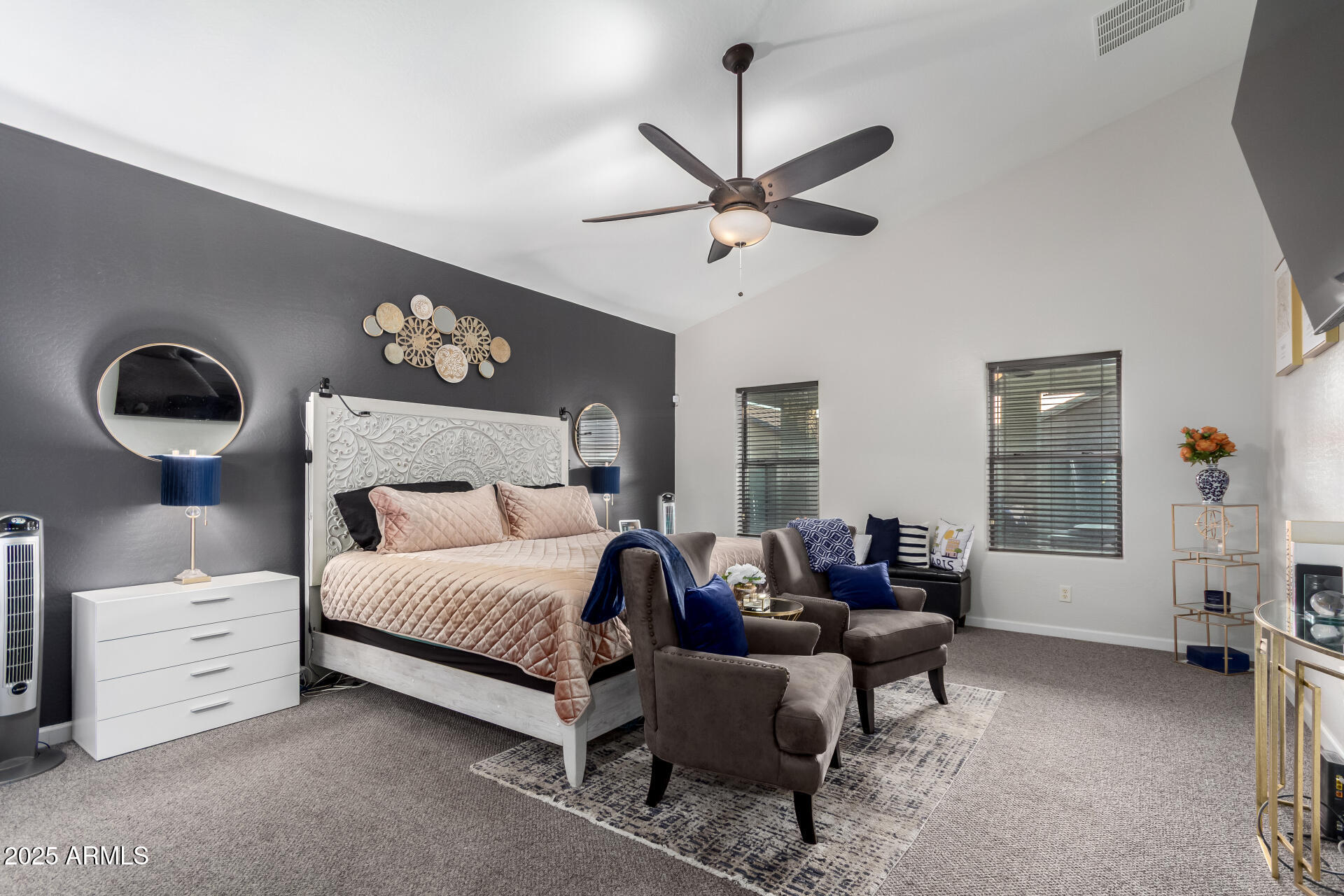 854 South Del Rio Court Apache Junction, AZ 85119 - Photo 27 of 57 a bedroom with a bed couch and window