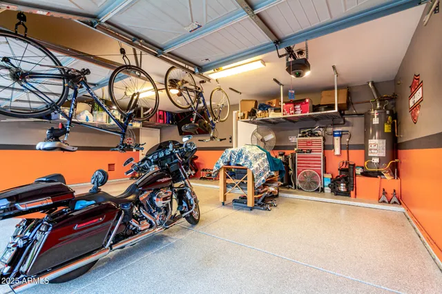 a dining room with furniture and chandelier