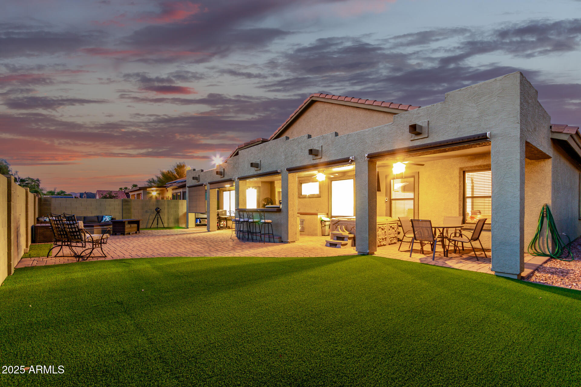 854 South Del Rio Court Apache Junction, AZ 85119 - Photo 44 of 57 a view of a house with a big yard and a large tree