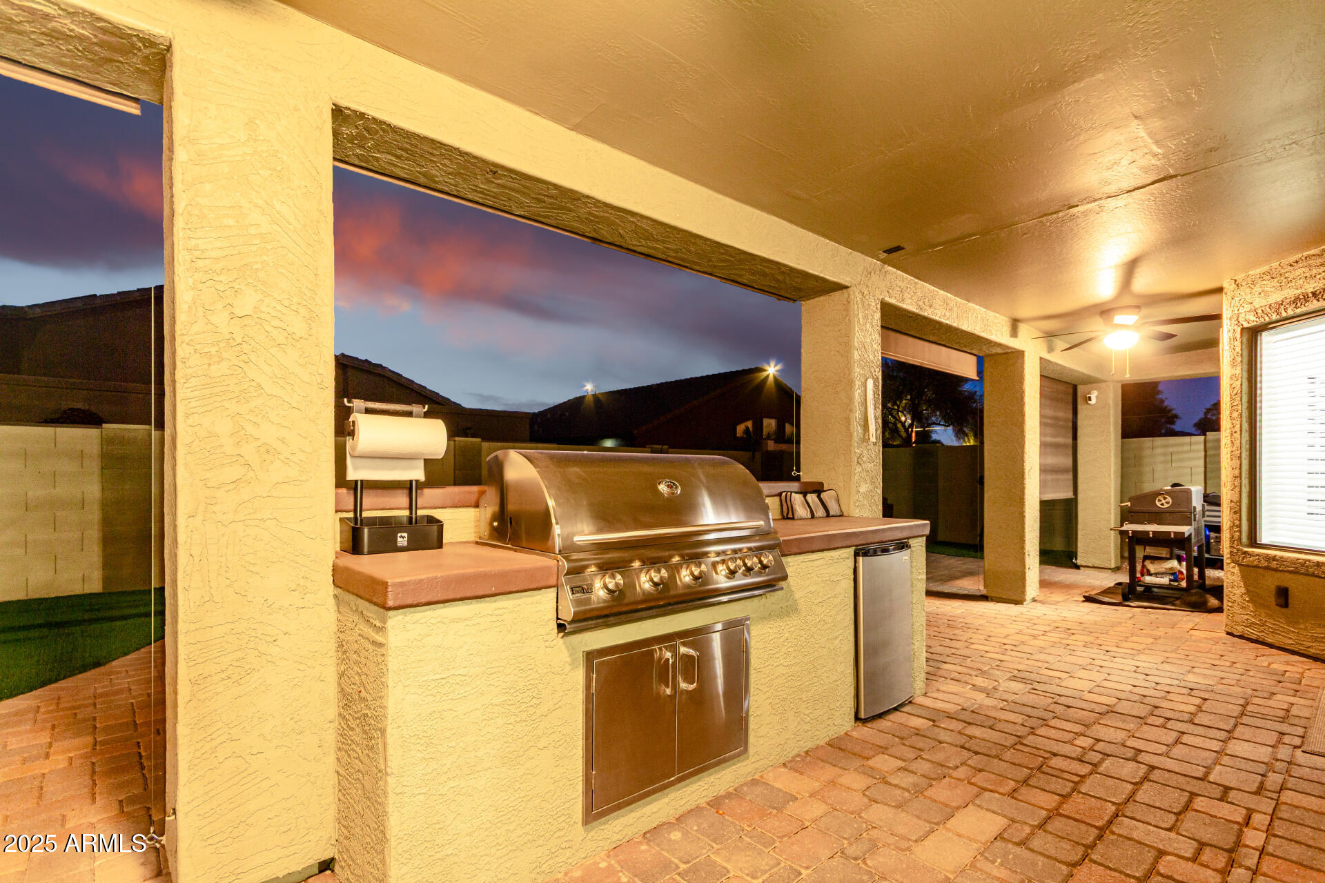 854 South Del Rio Court Apache Junction, AZ 85119 - Photo 52 of 57 a kitchen with stainless steel appliances granite countertop a stove a sink and a refrigerator