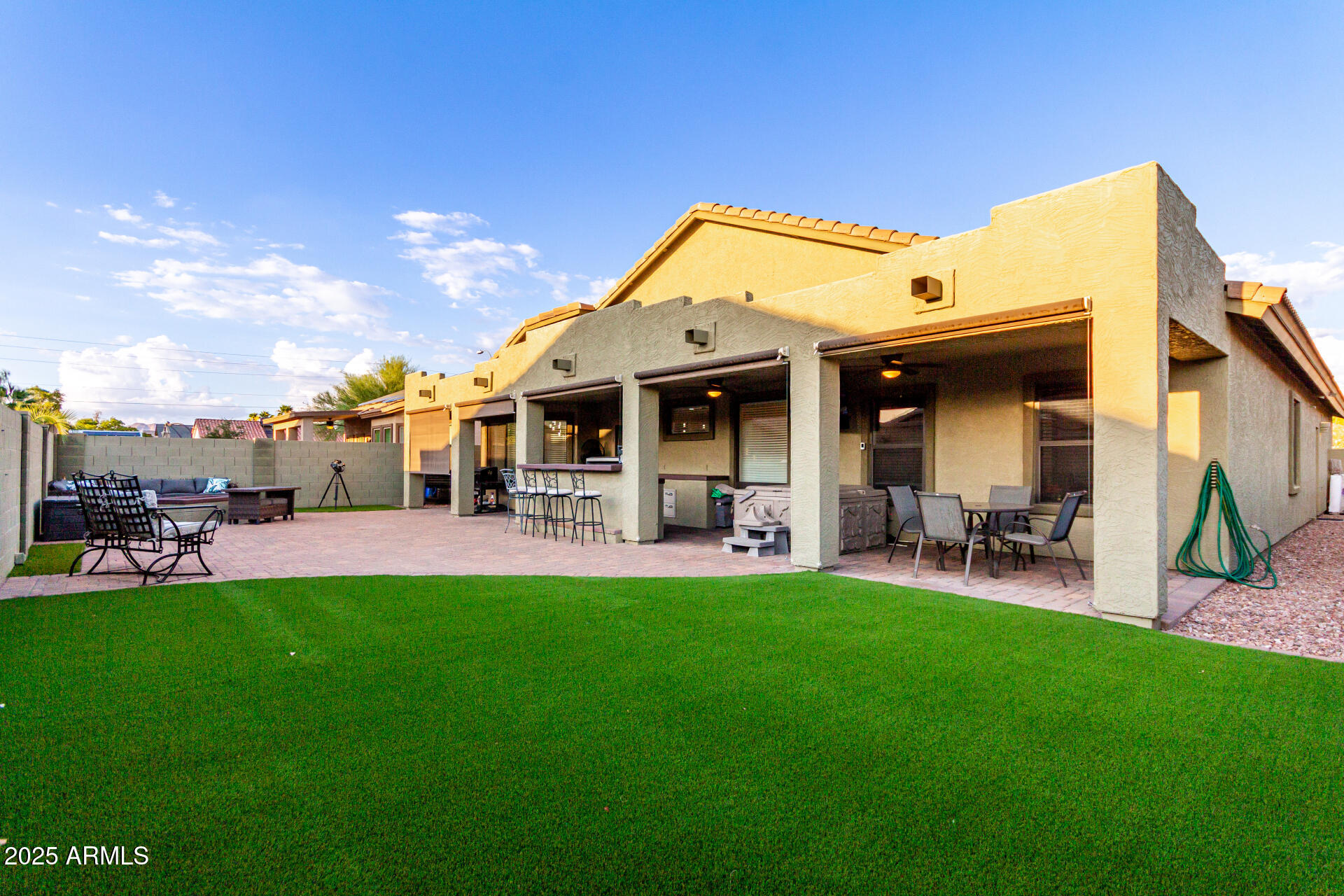 854 South Del Rio Court Apache Junction, AZ 85119 - Photo 54 of 57 a front view of a house with a garden and patio
