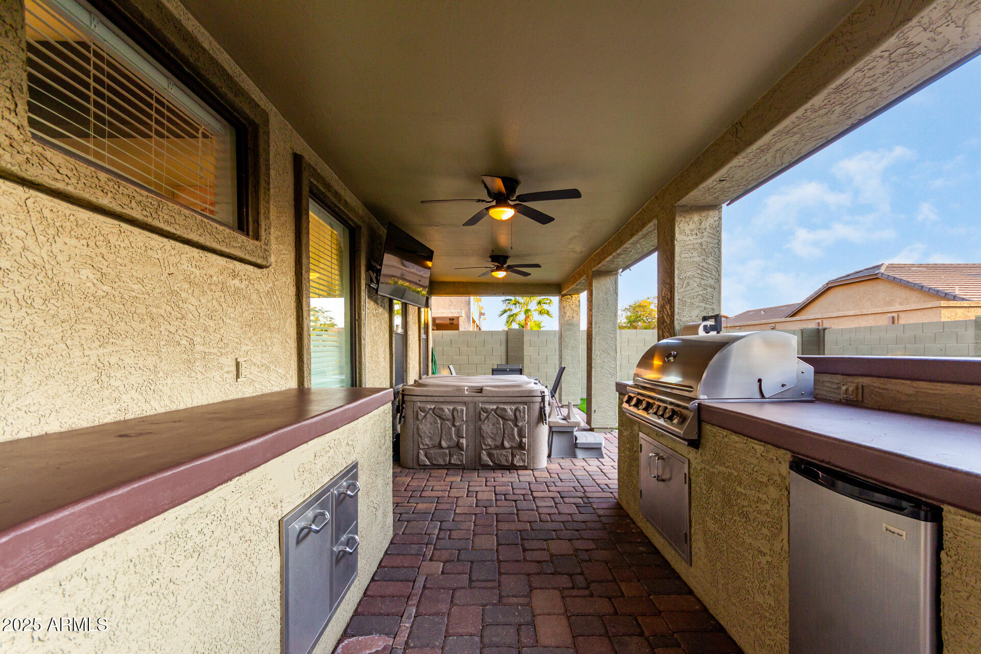 854 South Del Rio Court Apache Junction, AZ 85119 - Photo 56 of 57 a kitchen with stainless steel appliances granite countertop a sink and a stove