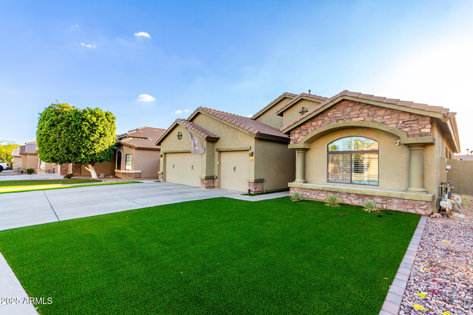 854 South Del Rio Court Apache Junction, AZ 85119 - Photo 10 of 57 a front view of a house with a garden