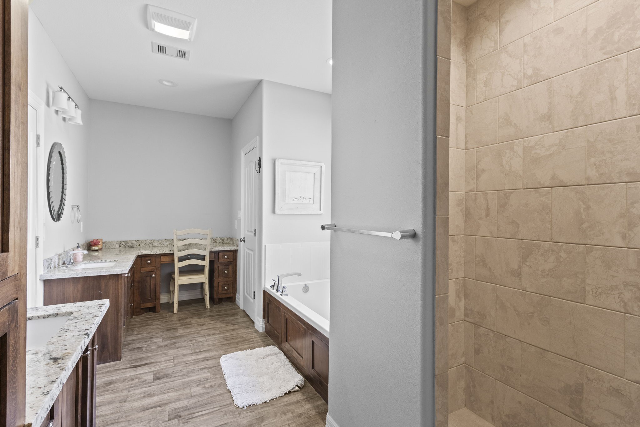 445 Bryant Boulevard Bridge City, TX 77611 - Photo 26 of 40 a room with a wooden floor and a view of kitchen