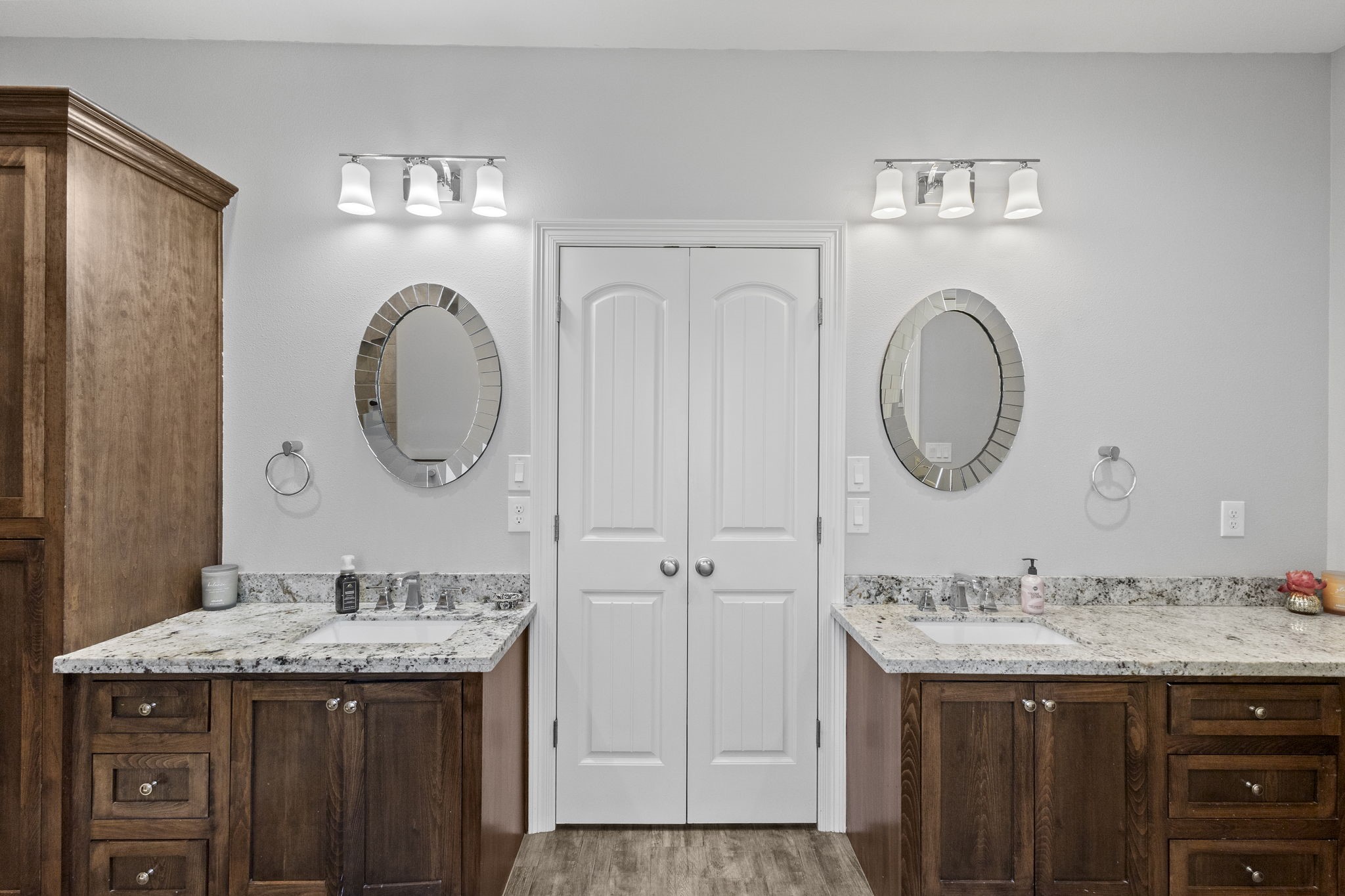 445 Bryant Boulevard Bridge City, TX 77611 - Photo 27 of 40 a bathroom with a granite countertop sink a mirror and a shower