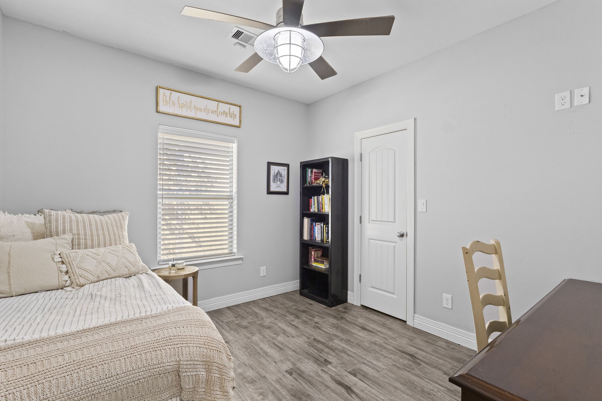 445 Bryant Boulevard Bridge City, TX 77611 - Photo 30 of 40 a bedroom with a bed and a window