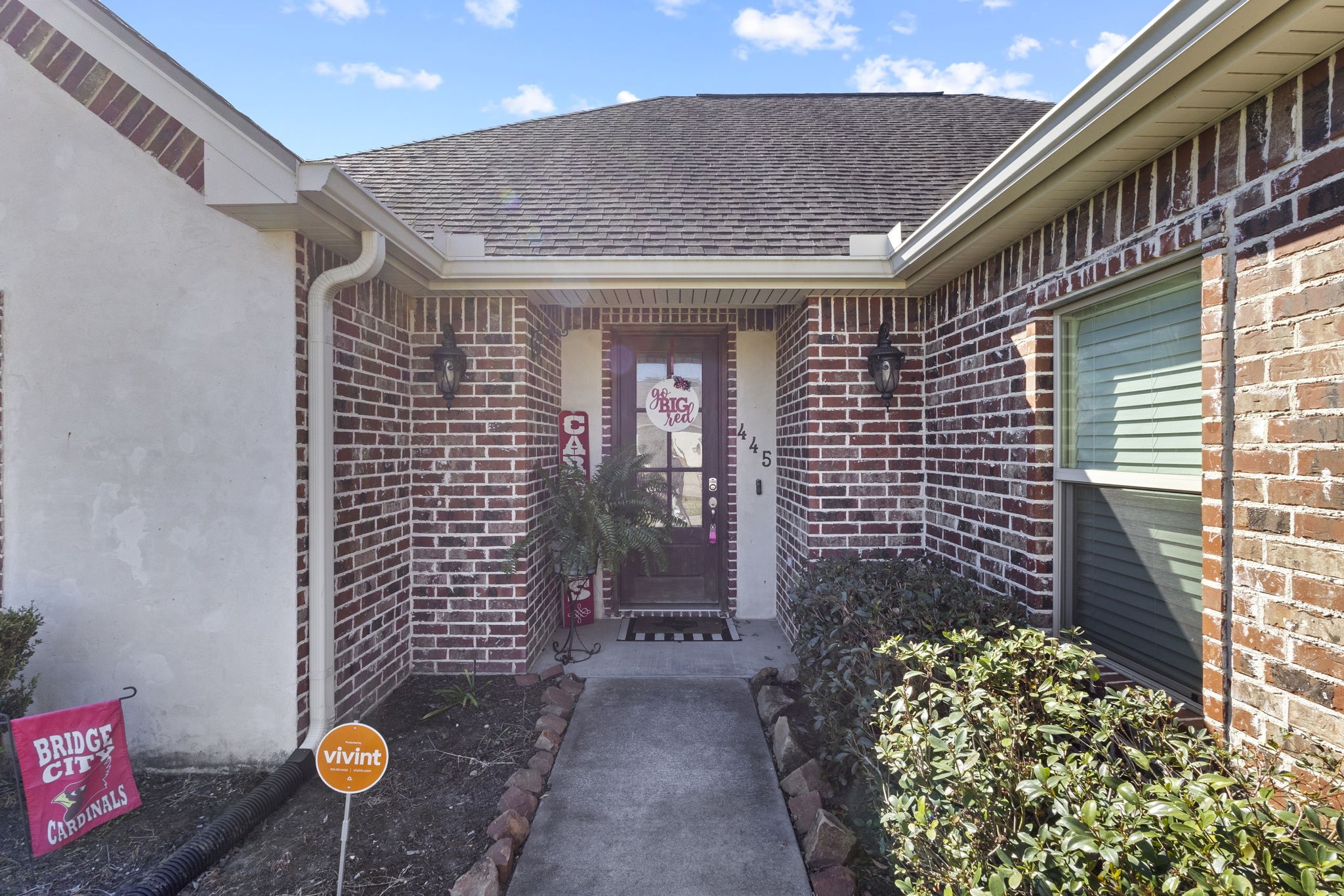 445 Bryant Boulevard Bridge City, TX 77611 - Photo 3 of 40 a front view of a house with chairs