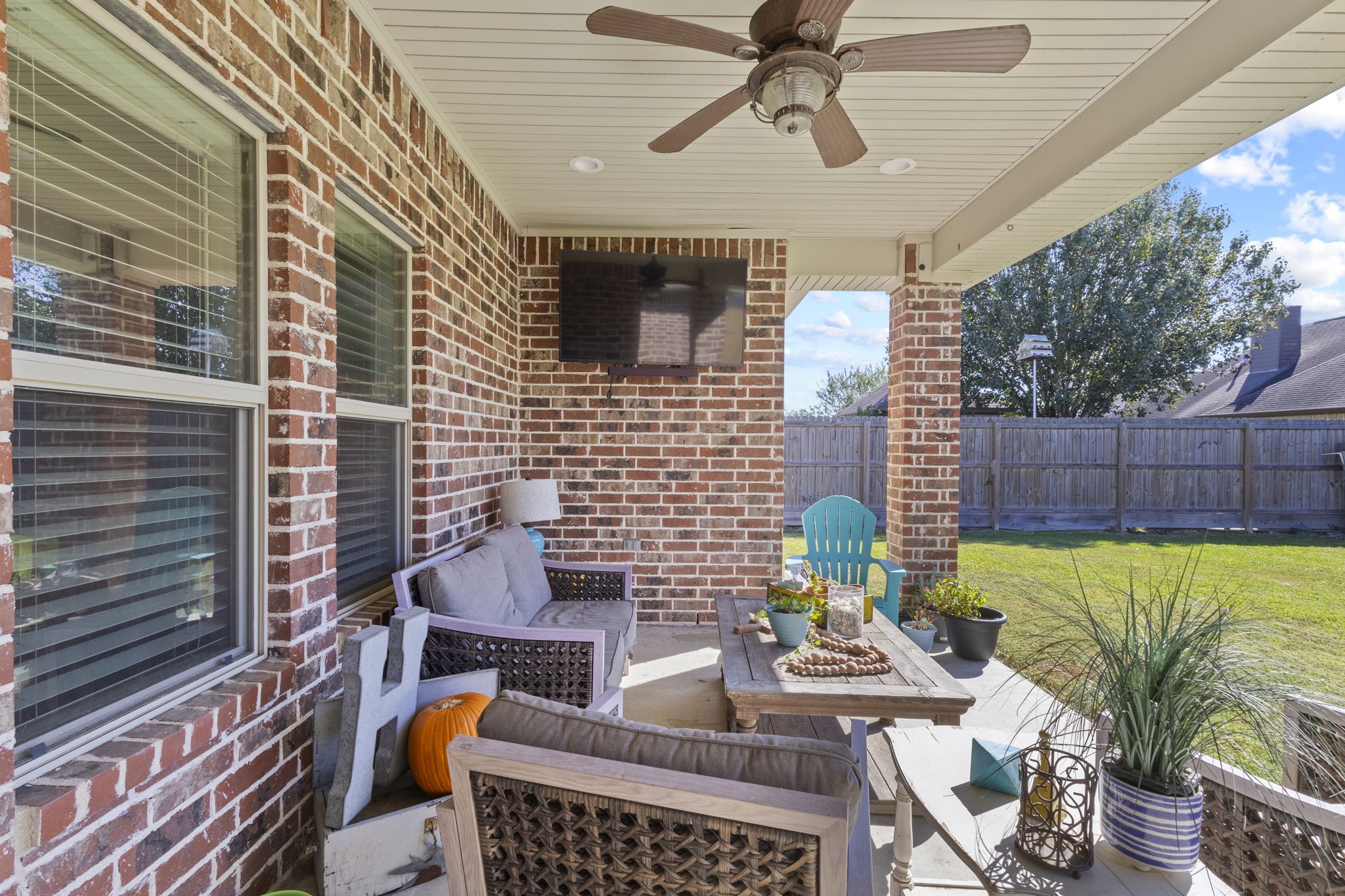 445 Bryant Boulevard Bridge City, TX 77611 - Photo 36 of 40 a view of a patio with table and chairs potted plants
