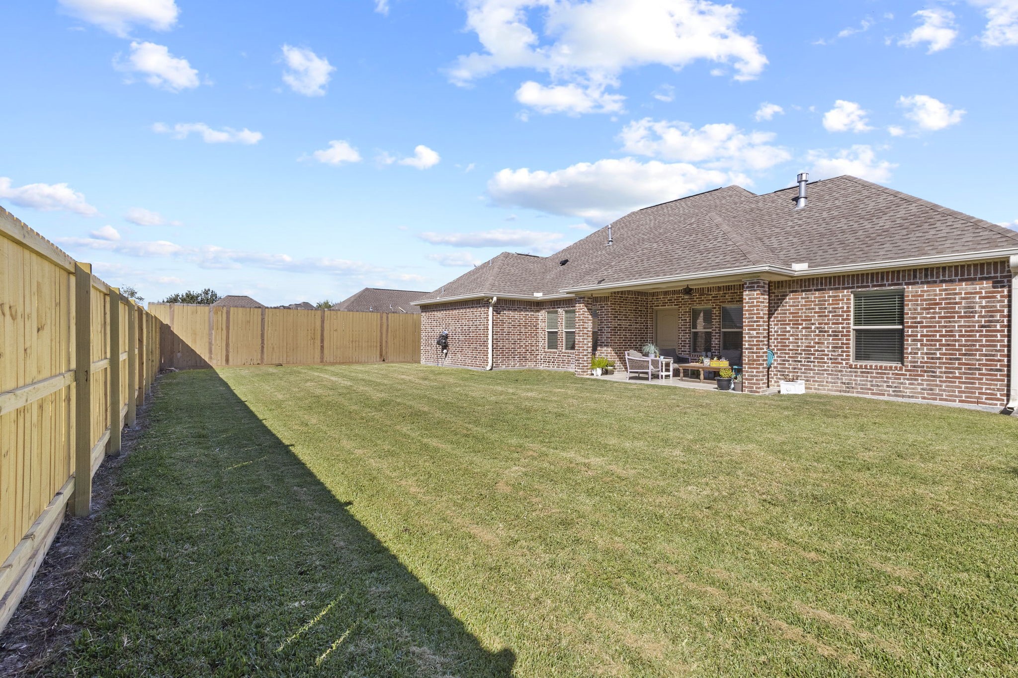 445 Bryant Boulevard Bridge City, TX 77611 - Photo 37 of 40 a front view of a house with a garden