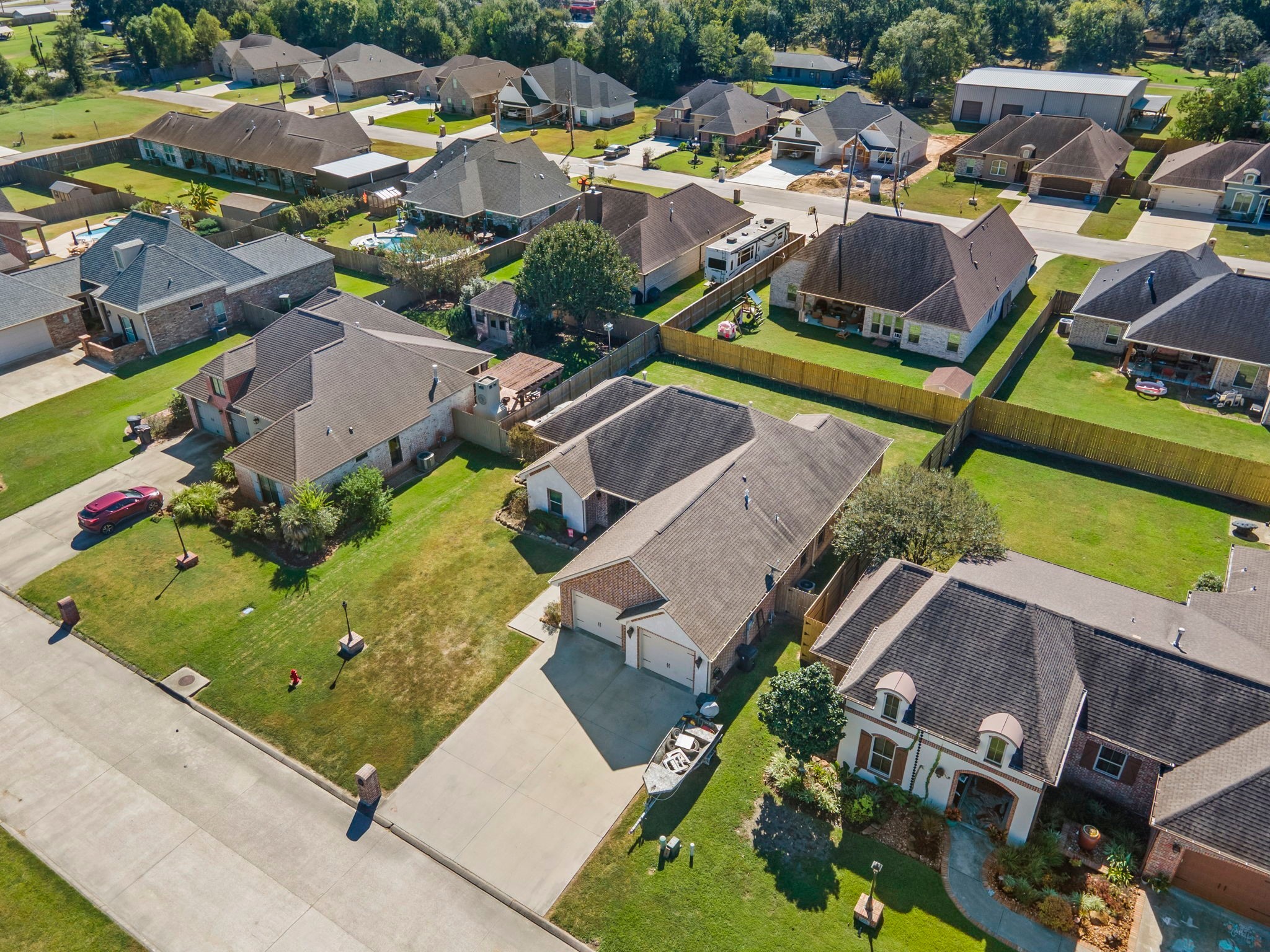 445 Bryant Boulevard Bridge City, TX 77611 - Photo 38 of 40 an aerial view of a house with a swimming pool yard and outdoor seating