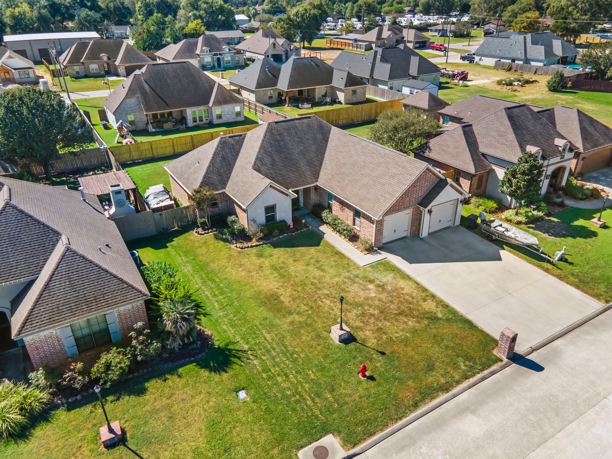 445 Bryant Boulevard Bridge City, TX 77611 - Photo 40 of 40 an aerial view of a house with swimming pool and outdoor space