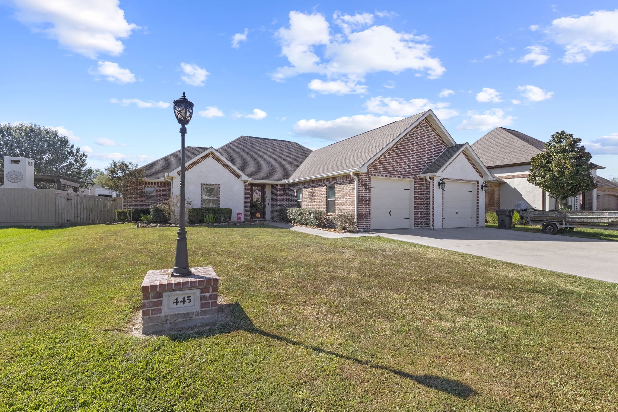 445 Bryant Boulevard Bridge City, TX 77611 - Photo 4 of 40 a front view of a house with a yard