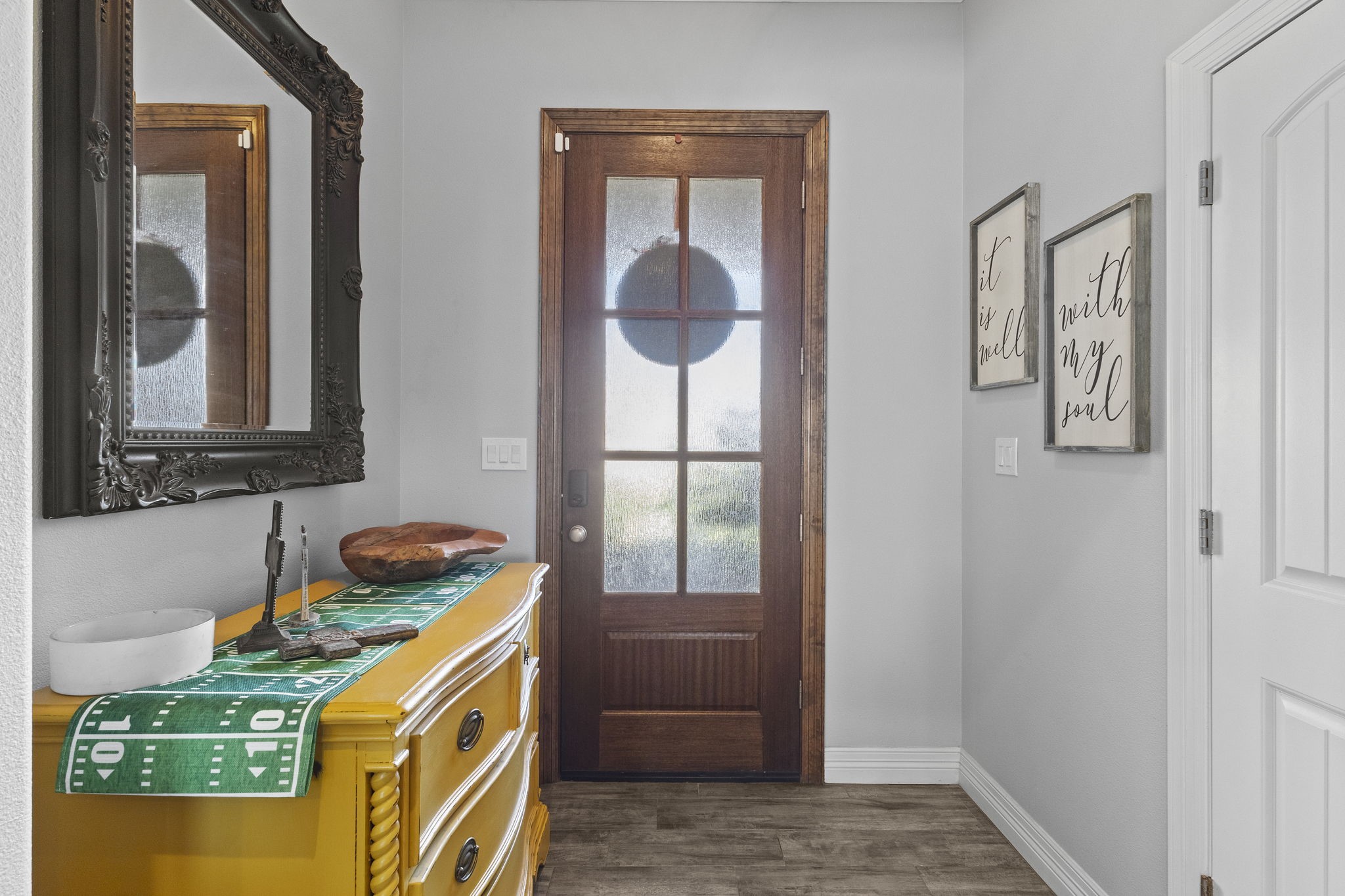 445 Bryant Boulevard Bridge City, TX 77611 - Photo 5 of 40 a bedroom with a bed and a mirror