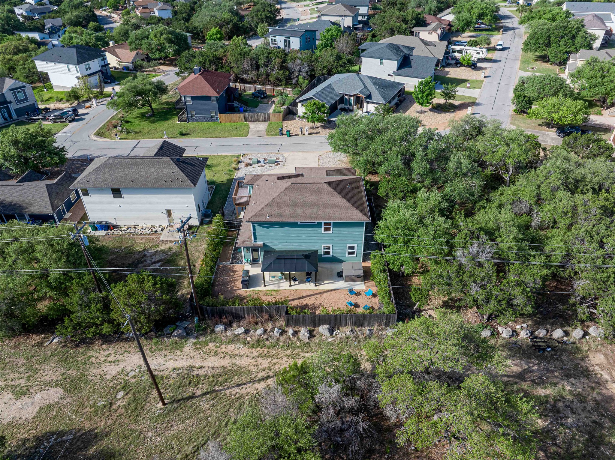 410 Summit Ridge Drive North Point Venture, TX 78645 - Photo 28 of 37 an aerial view of a house with a yard