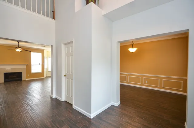 a view of a livingroom with wooden floor