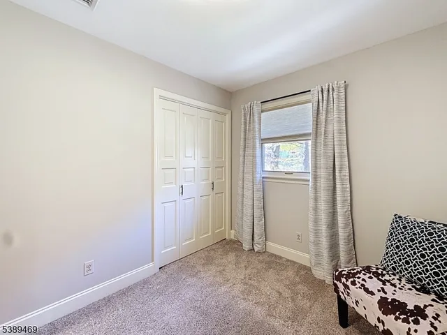 a very nice looking room with a large window