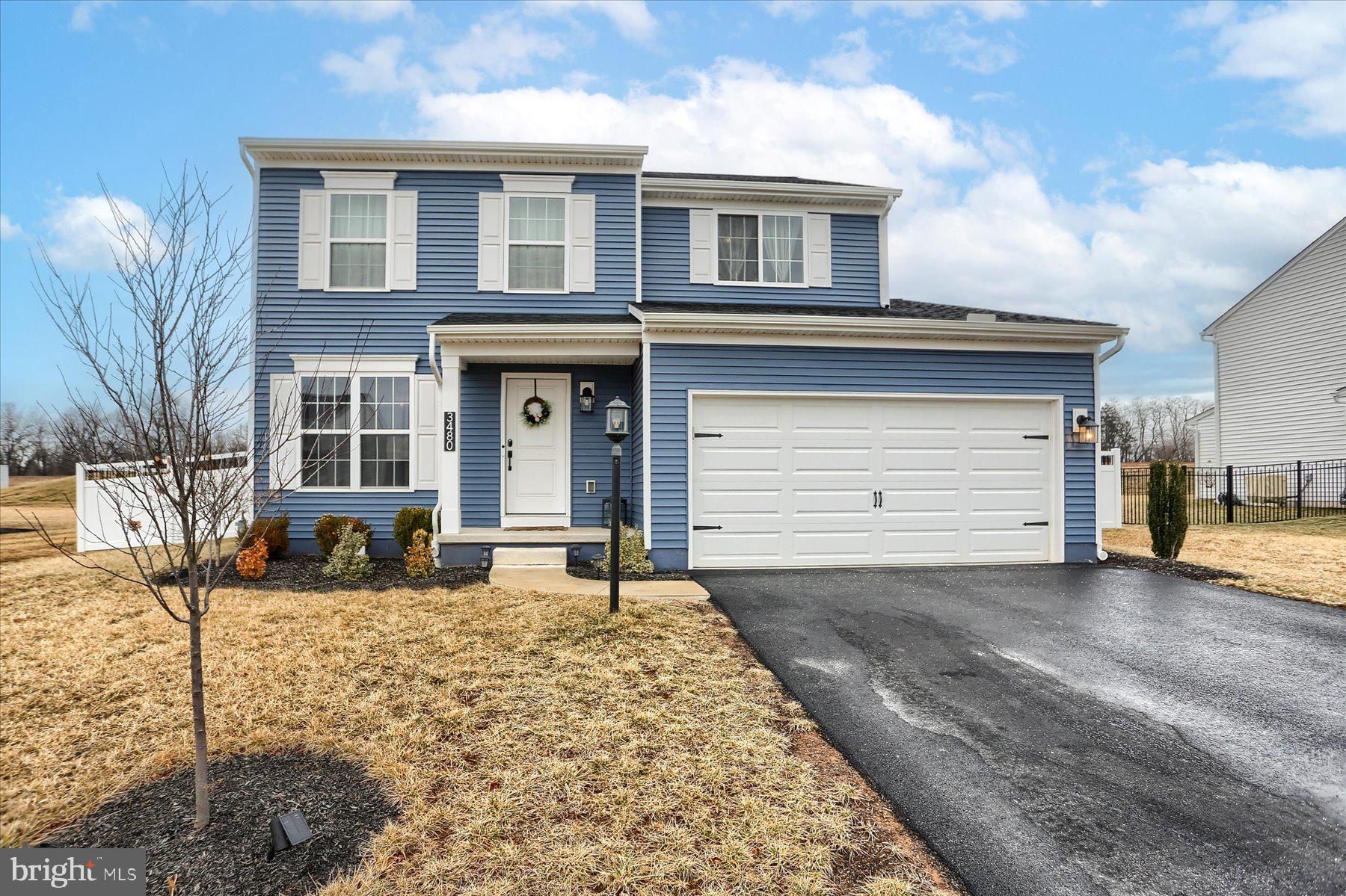 3480 Winter Drive Dover, PA 17315 - Photo 1 of 39 a front view of a house with a yard